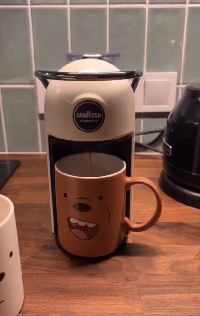 Lavazza A Modo Mio pod coffee machine on kitchen counter in Tallinn